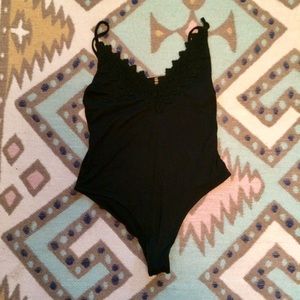 New with tags! Free People bodysuit w crochet neck